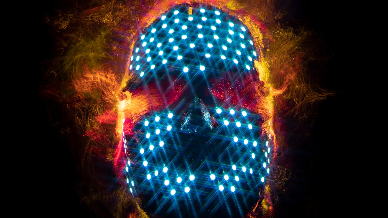 Abstract image of a digital skull with glowing neon lights, representing technology and innovation.